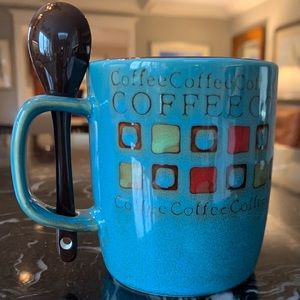 Coffee mug with it’s own spoon
